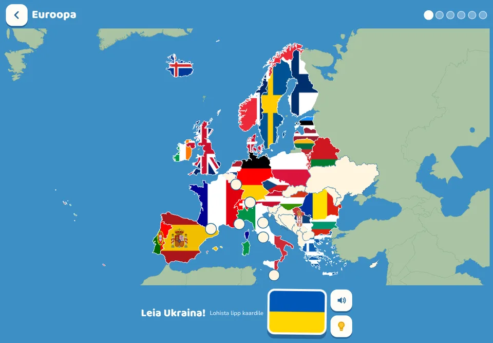 TerraKidsi äpp: pooleldi lippudega täidetud Euroopa kaart ja Ukraina lipp, mis ootab lohistamist.